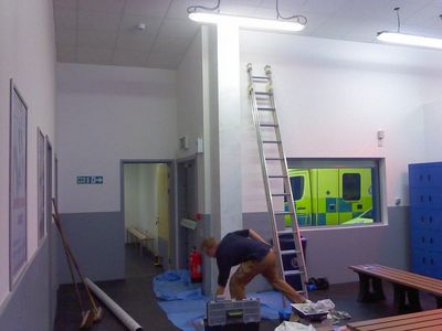 Decorators Working on Finishing Touches
