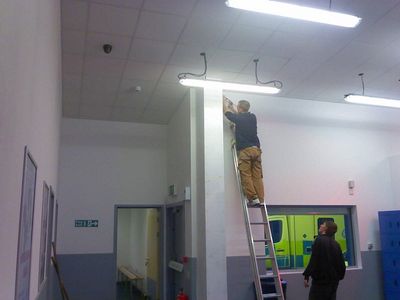 Decorators Working on Finishing Touches
