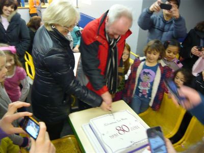 Senior coaches Diane Towler-Green MBE and Roland Hailstone cut the cake
