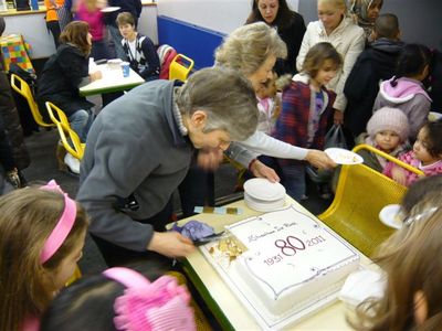 Cake is distributed to over 100 people
