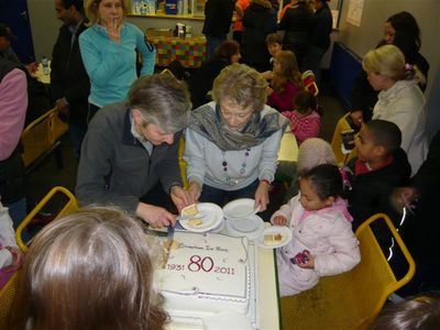 Cake is distributed to over 100 people
