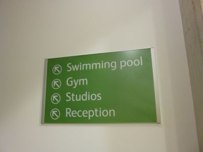 Sign Leading Upwards from Basement Level
