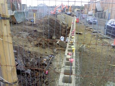 New Wall Between Church Site and Rink
