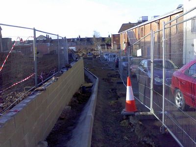 New Wall Between Church and Rink
