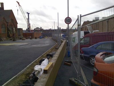 New Wall Between Church and Rink
