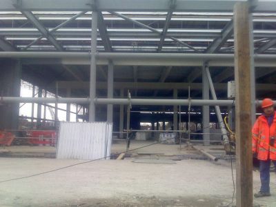 Through Tesco Building
