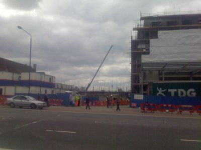Development between Tesco Building and Church from Across the High Road
