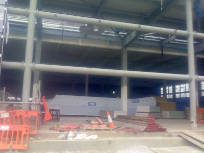 Through Tesco Building
