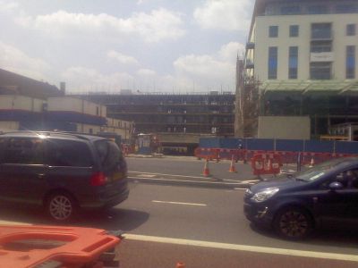 Car Park Entrance from Across the High Road
