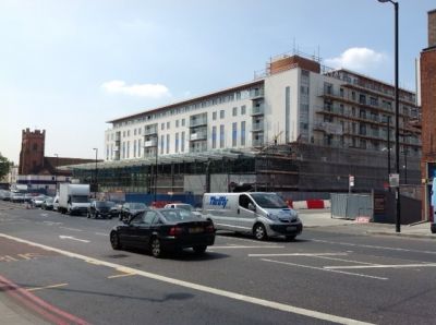 View of Tesco/Residential Building from Across the High Road
