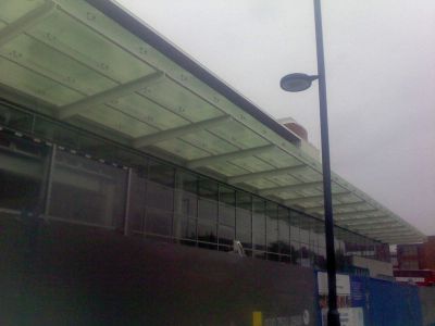 Through Tesco Building
