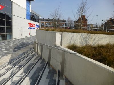 Steps up to Tesco Side of Paving
